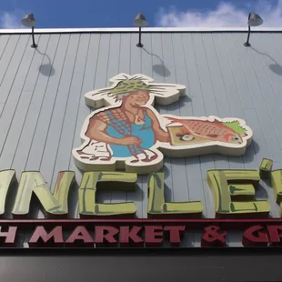 Uncle&apos;s Fish Market &amp; Grill entrance sign.