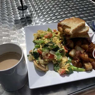 Decaf coffee, veggie scramble with home fries and toast.