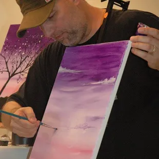 Showing off from behind the canvas!