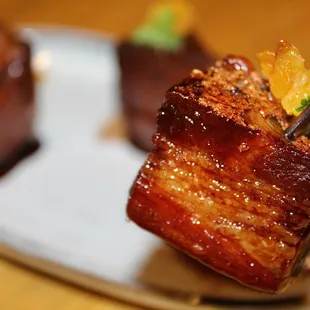 The Pork Belly Bites were succulent and packed with flavor.