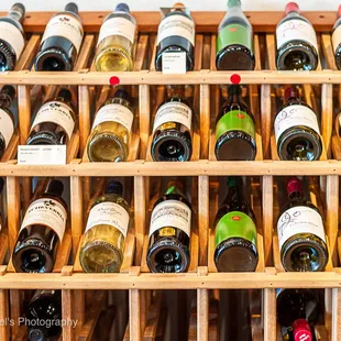 a rack of wine bottles