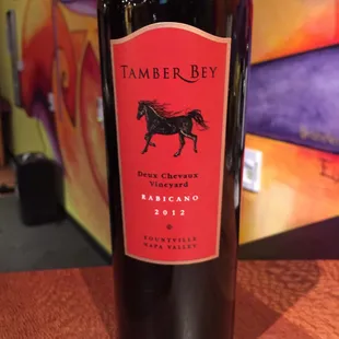 a bottle of wine on a table