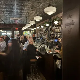 Tin ceiling, brick and warm wood