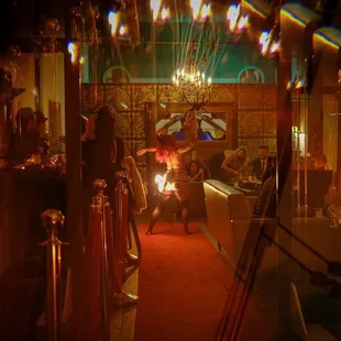 a group of people sitting at a bar