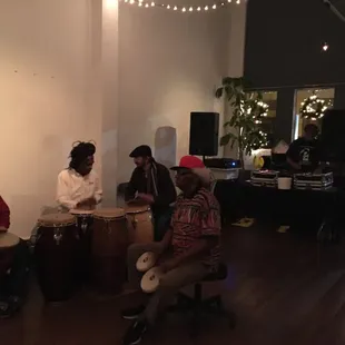 DJ with percussionists