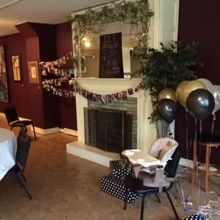 Banquet room setup for a one year old birthday party.