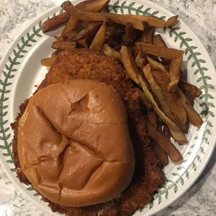 Pork schnitzel sandwich and fresh cut fries