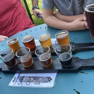 Flight of 8  Smoked, chai, dirty dirty blonde, blueberry cream stout, amber, prohibition ale, English IPA, and peach cream ale.