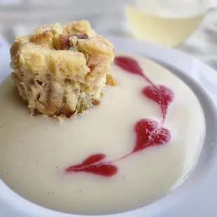 Lavender sourdough bread pudding topped with lavender rum glaze