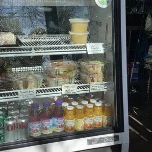 a refridgerator filled with drinks