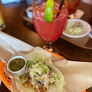 Taco and watermelon margarita on the rocks