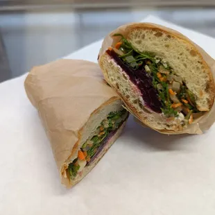 Roasted Beet.  Tarragon roasted beets, blue cheese spread and arugula slaw on crusty baguette.