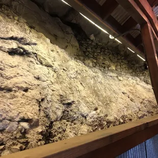 Inside next to our table.... Cliff walls.  Cool.