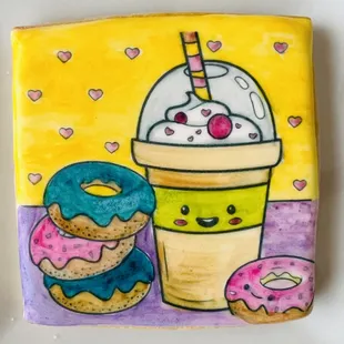 a cup of coffee and donuts