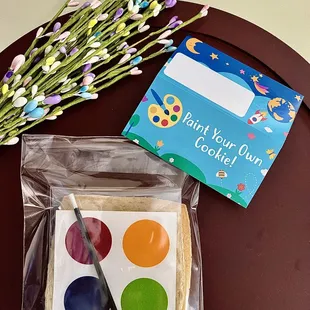 a cookie with paint your own cup cookies