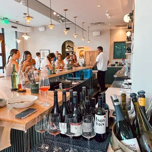 a group of people at a bar