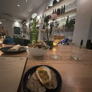 Grilled oysters and broccoli and red onion
