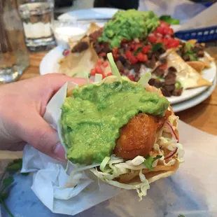 Baja style fish taco (Nick's way) and grande steak nachos