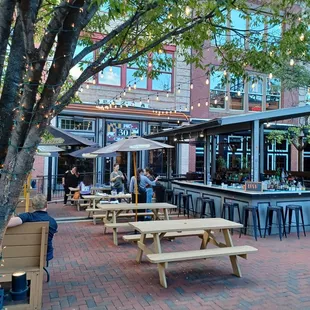 Store front with outdoor seatings.