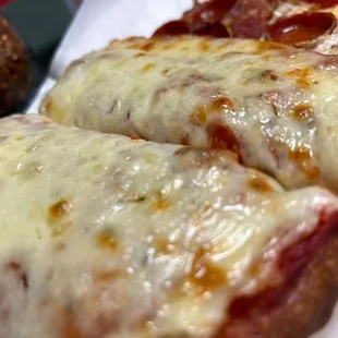 a slice of pepperoni pizza