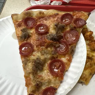 Two pieces of pizza and a drink for $8.50.  For lunch I fed my family of 4 for under $50.  Great food and service.  Real NY pizza!!