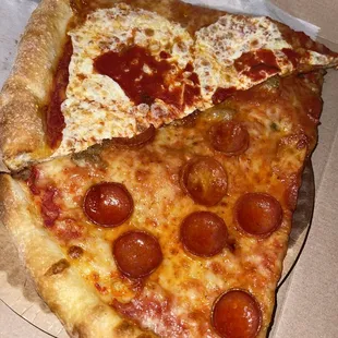This is a margarita pizza and a pepperoni pizza.