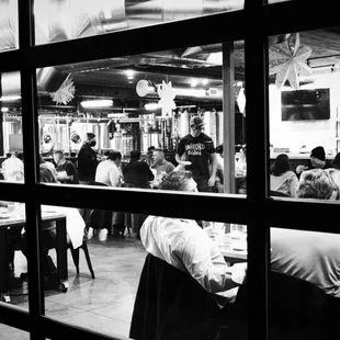 a black and white photo of a restaurant