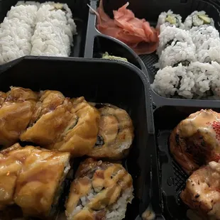 Clockwise starting on top left: Philly roll, avocado cucumber roll, salmon lava bomb, south Philly roll.