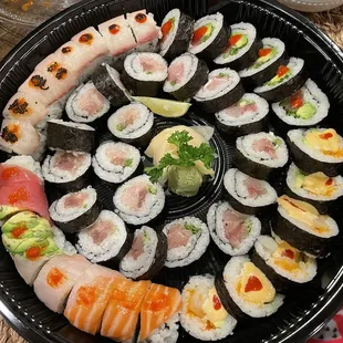 a platter of sushi on a table