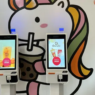 two kiosk kiosks with unicorns on them