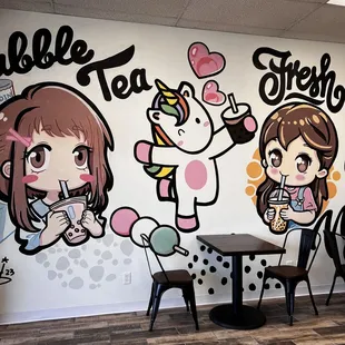a mural of a girl and a cow