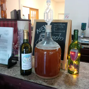bottles of wine and a chalkboard