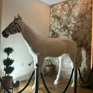 The handsome guy welcoming you at the door