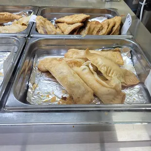 a variety of pastries in trays