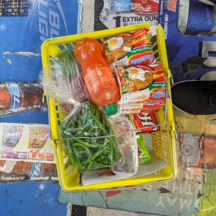 a basket of food on the ground