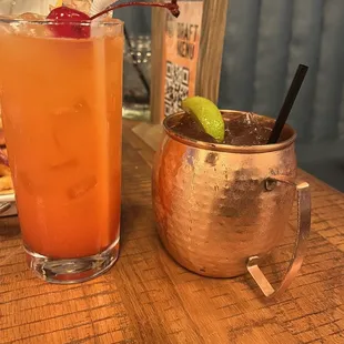 two cocktails on a table