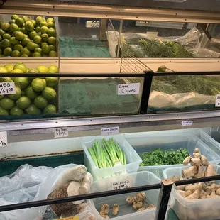 a variety of vegetables in plastic containers