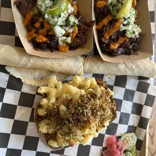 From the food truck - 2 orders of barbacoa, fresh tortillas, and mac &amp; cheese. Loved the pickled onions
