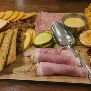 Awesome meat and cheese board. The herb spiced goat cheese is really good
