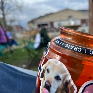 a dog's face on a jar