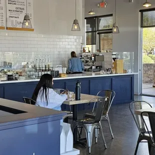 a man and a woman in a cafe