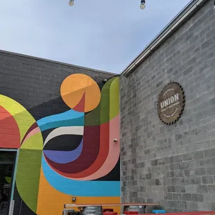 a colorful mural on the side of a building