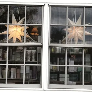 the reflection of a star in a window
