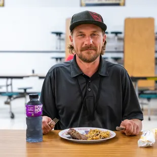 Program man enjoying lunch