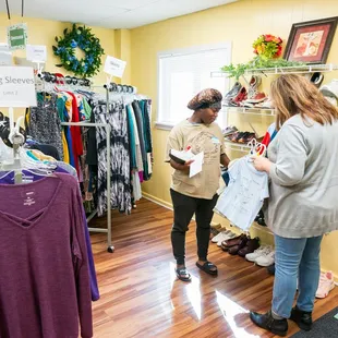 Women clothes closet guest shopping for shoes