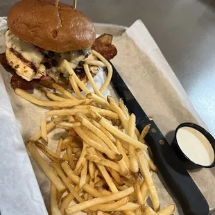 Grilled chicken sandwich on a gluten-free bun with shoestring french fries