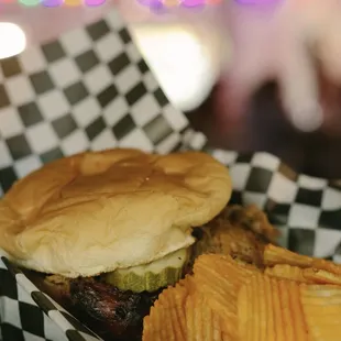 a burger and potato chips