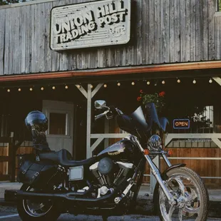a motorcycle parked in front of a building