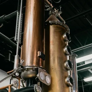 a close up of a copper still
