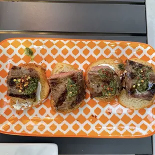 Pesto steak crostini